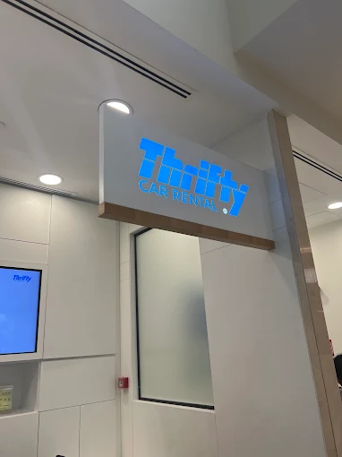 Thrifty Car Rental sign at Deira City Center in Dubai.